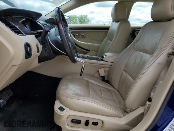 2015 Ford Taurus Limited with VIN 1FAHP2J85FG133521, listed as a Copart auction lot 57411685 with 140,535 mi miles and Salvage title. Bid and sale history available at DreamBid. Image 7.