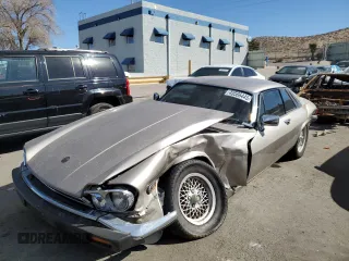 1989 Jaguar XJS z VIN SAJNA5848KC149069, wystawiony jako Copart lot #45566445 z przebiegiem 82 631 mil mil oraz Szkoda całkowita • Salvage title. Historia ofert i sprzedaży dostępna na DreamBid. Obrazek 1.