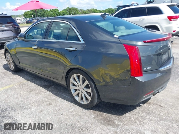 2014 Cadillac ATS Luxury RWD z VIN 1G6AB5RAXE0142079, wystawiony jako IAAI lot #42517963 z przebiegiem 140 118 mil mil oraz . Historia ofert i sprzedaży dostępna na DreamBid. Obrazek 3.