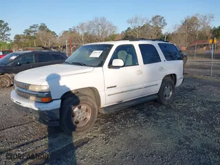 2001 Chevrolet Tahoe LT with VIN 1GNEC13T91R140982, listed as a IAAI auction lot 41801748 with 429,014 mi miles. Bid and sale history available at carsss.com. Image 2.