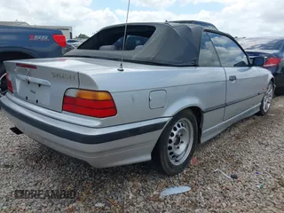 1998 BMW 3 Series 323icA with VIN WBABJ8334WEM22565, listed as a IAAI auction lot 41927799 with 165,077 mi miles. Bid and sale history available at carsss.com. Image 4.