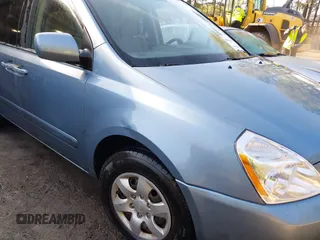 2007 Kia Sedona EX with VIN KNDMB233376173452, listed as a IAAI auction lot 41994451 with 201,849 mi miles. Bid and sale history available at carsss.com. Image 6.