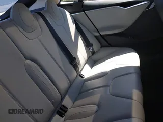 2014 Tesla Model S 60 z VIN 5YJSA1H17EFP33910, wystawiony jako IAAI lot #42346934 z przebiegiem Nie podano mil oraz . Historia ofert i sprzedaży dostępna na DreamBid. Obrazek 8.