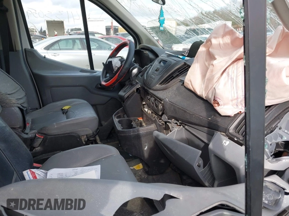 2015 Ford Transit Cargo with VIN 1FTNE1ZM1FKA69893, listed as a IAAI auction lot 41330596 with 234,974 mi miles. Bid and sale history available at carsss.com. Image 5.
