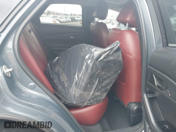 2022 Mazda CX-30 S Carbon Edition with VIN 3MVDMBCL6NM431985, listed as a IAAI auction lot 42610558 with Not provided miles and . Bid and sale history available at DreamBid. Image 8.