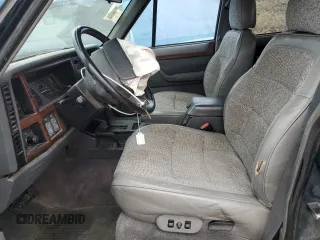 1995 Jeep Cherokee Country with VIN 1J4FJ78S5SL636284, listed as a Copart auction lot 76145234 with 104,048 mi miles and Salvage Title. Bid and sale history available at carsss.com. Image 7.