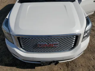 2015 GMC Yukon Denali z VIN 1GKS2CKJ9FR622342, wystawiony jako Copart lot #53671555 z przebiegiem Nie podano mil oraz Czysty tytuł • Clean title. Historia ofert i sprzedaży dostępna na DreamBid. Obrazek 12.