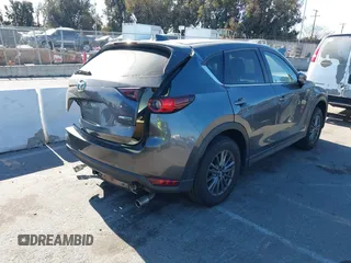 2020 Mazda CX-5 Touring with VIN JM3KFACM4L0743820, listed as a IAAI auction lot 41361054 with 1 mi miles. Bid and sale history available at carsss.com. Image 4.