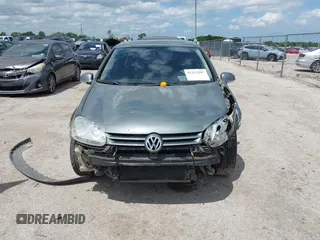 2007 Volkswagen Rabbit z VIN WVWDR71K17W224630, wystawiony jako IAAI lot #42113287 z przebiegiem 205 748 mil mil oraz . Historia ofert i sprzedaży dostępna na DreamBid. Obrazek 12.