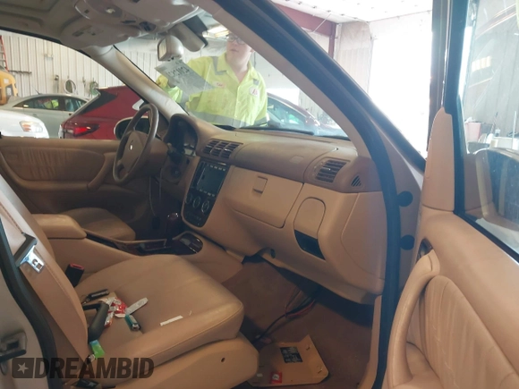 2005 Mercedes-Benz M 500 with VIN 4JGAB75E05A525942, listed as a IAAI auction lot 42012823 with 176,682 mi miles and . Bid and sale history available at DreamBid. Image 5.