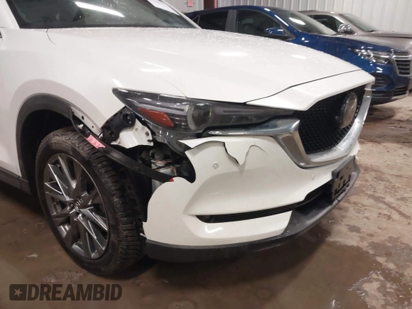 2019 Mazda CX-5 Signature with VIN JM3KFBEY5K0520593, listed as a IAAI auction lot 41638594 with 111,504 mi miles. Bid and sale history available at carsss.com. Image 6.