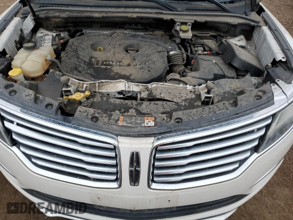 2015 Lincoln MKC z VIN 5LMTJ2AH6FUJ37822, wystawiony jako Copart lot #51931505 z przebiegiem 138 188 mil mil oraz Szkoda całkowita • Salvage title. Historia ofert i sprzedaży dostępna na DreamBid. Obrazek 13.