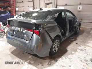 2020 Toyota Prius LE with VIN JTDL9RFU5L3020409, listed as a IAAI auction lot 41171668 with 122,208 mi miles and . Bid and sale history available at DreamBid. Image 4.