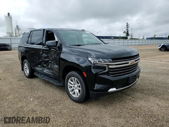 2022 Chevrolet Tahoe LT z VIN 1GNSKNKD0NR196614, wystawiony jako Copart lot #57806285 z przebiegiem 25 706 mil mil oraz Szkoda całkowita • Salvage title. Historia ofert i sprzedaży dostępna na DreamBid. Obrazek 14.