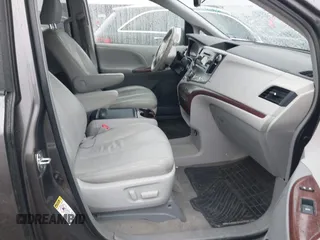 2014 Toyota Sienna XLE with VIN 5TDYK3DC0ES502482, listed as a IAAI auction lot 41910683 with 151,330 mi miles. Bid and sale history available at carsss.com. Image 5.