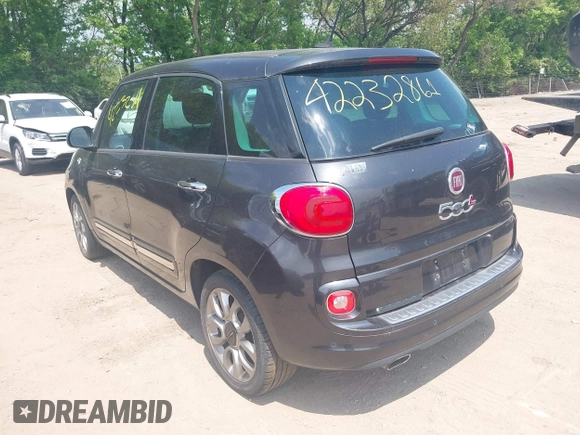 2014 FIAT 500L Lounge with VIN ZFBCFACH1EZ003031, listed as a IAAI auction lot 42232861 with 104,496 mi miles and . Bid and sale history available at DreamBid. Image 3.