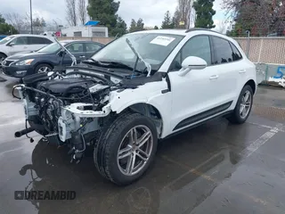 2024 Porsche Macan with VIN WP1AA2A57RLB12571, listed as a IAAI auction lot 41243341 with 4,744 mi miles and . Bid and sale history available at DreamBid. Image 2.