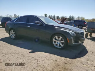 2016 Cadillac CTS Luxury Collection AWD with VIN 1G6AX5SS6G0184823, listed as a Copart auction lot 52234445 with 77,084 mi miles and Clean Title. Bid and sale history available at DreamBid. Image 4.