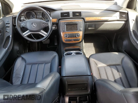 2009 Mercedes-Benz R 3.5L with VIN 4JGCB65E79A091057, listed as a Copart auction lot 52186915 with 99,173 mi miles and Salvage Title. Bid and sale history available at DreamBid. Image 8.