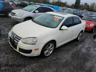 2007 Volkswagen Jetta 2.5 z VIN 3VWSF71KX7M043040, wystawiony jako Copart lot #45791765 z przebiegiem 233 291 mil mil oraz Czysty tytuł • Clean title. Historia ofert i sprzedaży dostępna na DreamBid. Obrazek 1.