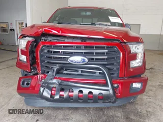 2015 Ford F-150 XLT with VIN 1FTEW1EG8FFC25479, listed as a IAAI auction lot 42010036 with 92,958 mi miles and . Bid and sale history available at carsss.com. Image 12.
