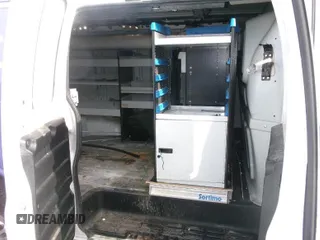 2015 Chevrolet Express Cargo Van with VIN 1GCWGFCF3F1159655, listed as a IAAI auction lot 42138892 with 174,633 mi miles. Bid and sale history available at carsss.com. Image 1.