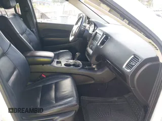 2013 Dodge Durango Crew with VIN 1C4RDHDGXDC608209, listed as a IAAI auction lot 42779231 with 203,460 mi miles and . Bid and sale history available at DreamBid. Image 5.
