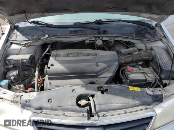 2002 Honda Odyssey EX with VIN 2HKRL186X2H006763, listed as a Copart auction lot 57317075 with 282,090 mi miles and Salvage title. Bid and sale history available at DreamBid. Image 12.