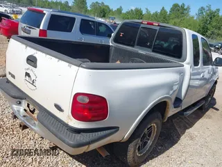 2002 Ford F-150 XL with VIN 1FTRX08L12KB49882, listed as a IAAI auction lot 42121639 with Not provided miles and . Bid and sale history available at DreamBid. Image 4.