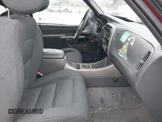 2001 Ford Explorer Sport z VIN 1FMYU60E81UC77250, wystawiony jako IAAI lot #41772987 z przebiegiem 210 869 mil mil oraz . Historia ofert i sprzedaży dostępna na DreamBid. Obrazek 5.