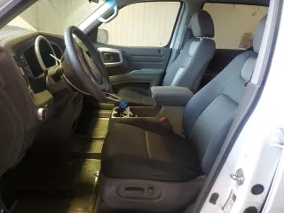 2006 Honda Ridgeline RTS z VIN 2HJYK16456H554437, wystawiony jako Copart lot #56571295 z przebiegiem 127 895 mil mil oraz Szkody całkowita. Historia ofert i sprzedaży dostępna na DreamBid. Obrazek 7.