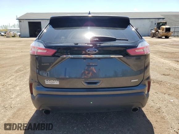 2020 Ford Edge SE с VIN 2FMPK3G9XLBA36257, выставлен на аукционе Copart как лот 57227695 с пробегом 90 588 миль миль и Списание • Salvage title. История ставок и продаж доступна на DreamBid. Изображение 6.