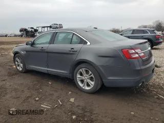 2017 Ford Taurus SEL with VIN 1FAHP2E8XHG105713, listed as a Copart auction lot 50795285 with 136,937 mi miles and Salvage Title. Bid and sale history available at DreamBid. Image 2.