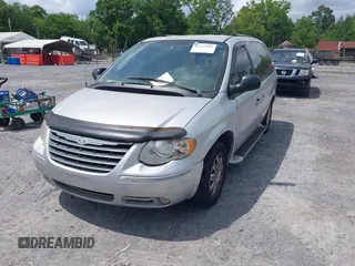 2006 Chrysler Town & Country LWB Limited with VIN 2A8GP64L26R797487, listed as a IAAI auction lot 42127082 with 126,548 mi miles. Bid and sale history available at carsss.com. Image 2.