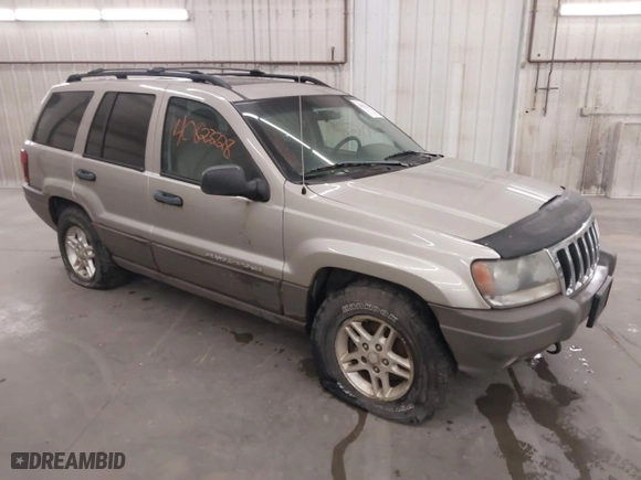 2003 Jeep Grand Cherokee Laredo with VIN 1J4GW48SX3C544237, listed as a IAAI auction lot 40823228 with 1 mi miles. Bid and sale history available at carsss.com. Image 1.