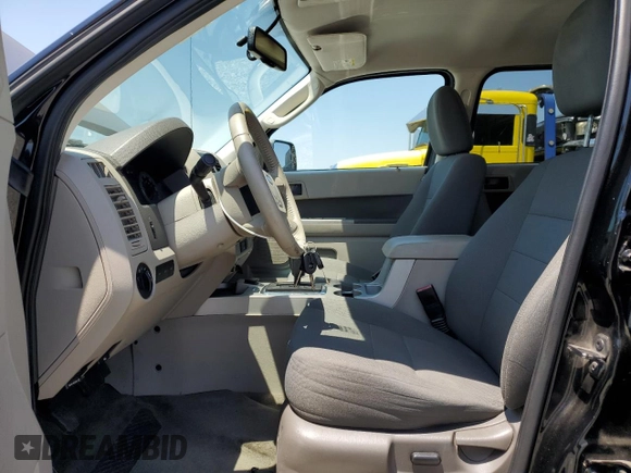 2009 Ford Escape Hybrid with VIN 1FMCU49399KB39692, listed as a Copart auction lot 64418925 with 147,204 mi miles and Salvage title. Bid and sale history available at DreamBid. Image 7.