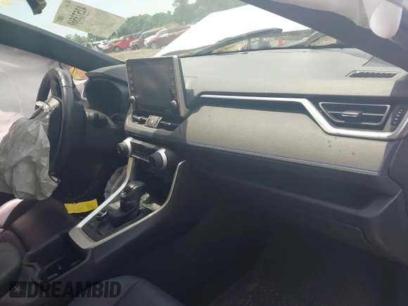 2022 Toyota RAV4 Hybrid XSE with VIN JTME6RFV2ND528229, listed as a IAAI auction lot 42573569 with 40,577 mi miles and . Bid and sale history available at DreamBid. Image 5.
