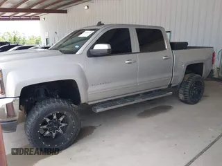 2017 Chevrolet Silverado 1500 LT with VIN 3GCPCRECXHG432552, listed as a IAAI auction lot 42052078 with 67,221 mi miles. Bid and sale history available at carsss.com. Image 2.