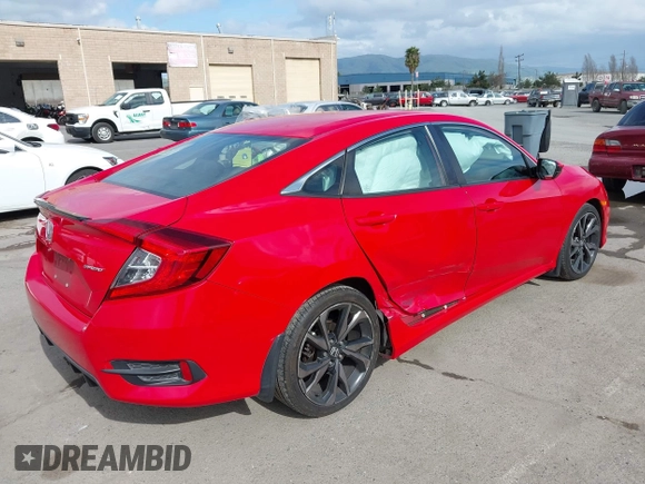 2019 Honda Civic Sport with VIN 2HGFC2F8XKH518773, listed as a IAAI auction lot 41934846 with 140,684 mi miles and . Bid and sale history available at DreamBid. Image 4.