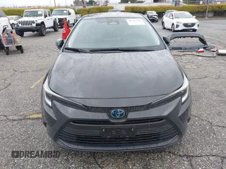 2023 Toyota Corolla Hybrid LE with VIN JTDBCMFE3P3020309, listed as a IAAI auction lot 41785944 with 19,617 mi miles. Bid and sale history available at carsss.com. Image 13.