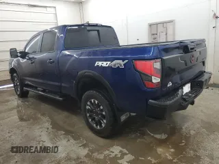 2024 Nissan Titan SV with VIN 1N6AA1FB2RN104714, listed as a Copart auction lot 56576955 with 25,800 mi miles and Salvage title. Bid and sale history available at DreamBid. Image 2.