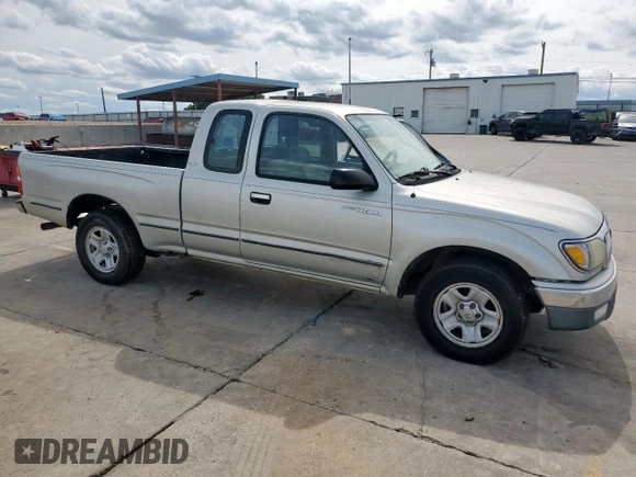 2003 Toyota Tacoma with VIN 5TEVL52N63Z207712, listed as a Copart auction lot 56349545 with 166,194 mi miles and Salvage title. Bid and sale history available at DreamBid. Image 4.