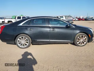 2014 Cadillac XTS Luxury with VIN 2G61M5S35E9228802, listed as a IAAI auction lot 42542501 with 106,506 mi miles and . Bid and sale history available at DreamBid. Image 13.