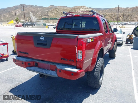 2015 Nissan Frontier SL with VIN 1N6AD0EV1FN711521, listed as a IAAI auction lot 42525352 with 203,114 mi miles and . Bid and sale history available at DreamBid. Image 4.
