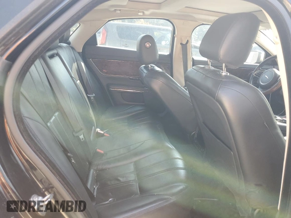2015 Jaguar XJ with VIN SAJWA1CZ7F8V83167, listed as a Copart auction lot 74991144 with 94,502 mi miles and Salvage Title. Bid and sale history available at carsss.com. Image 10.