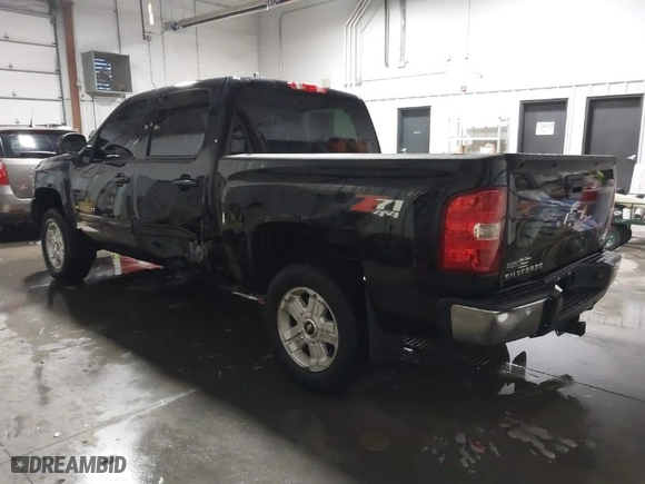 2011 Chevrolet Silverado 1500 LTZ with VIN 3GCPKTE33BG361069, listed as a IAAI auction lot 41274810 with 302,715 mi miles. Bid and sale history available at carsss.com. Image 3.