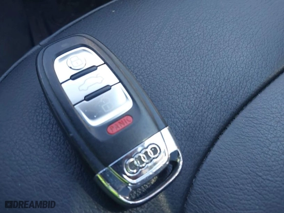 2015 Audi A4 Premium with VIN WAUBFAFL6FN042132, listed as a IAAI auction lot 41228669 with 104,143 mi miles. Bid and sale history available at carsss.com. Image 11.