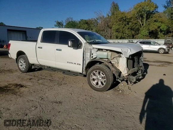 2021 Nissan Titan SV z VIN 1N6AA1FB8MN504530, wystawiony jako Copart lot #80914794 z przebiegiem 103 771 mil mil oraz Szkoda całkowita • Salvage title. Historia ofert i sprzedaży dostępna na DreamBid. Obrazek 14.