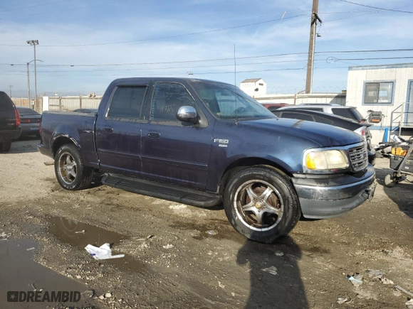2002 Ford F-150 XLT with VIN 1FTRW07LX2KC22722, listed as a Copart auction lot 46000825 with 270,945 mi miles and Salvage Title. Bid and sale history available at carsss.com. Image 4.