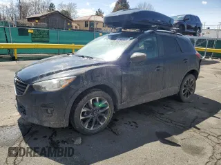 2016 Mazda CX-5 Grand Touring with VIN JM3KE4DYXG0730145, listed as a Copart auction lot 51666535 with 117,677 mi miles and Salvage Title. Bid and sale history available at carsss.com. Image 1.